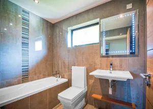Image of Outstanding lodge with one double with en suite shower and one twin (double by arrangement).