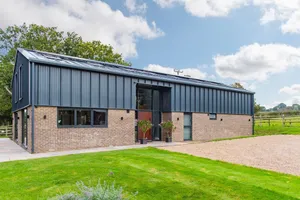 Image of Old Harrow Barn -  a barn  with hot tub by Bloom Stays, sleeping 10 guests  in 5 bedrooms