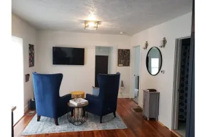 Image of 2 min from downtown Lincoln-Attractive & Cozy. Firepit & popcorn machine.