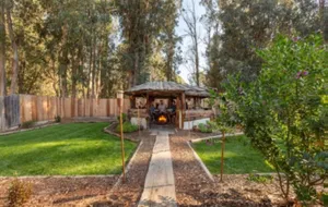 Image of Sanitized Country home with backyard tiki hut and firepit