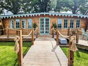 Image of Elegantly finished lodge with a private, decked garden.
