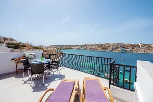 Image of GetawaysMalta - Harbour Lights Seafront Penthouse with Terrace St Pauls Bay