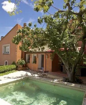 Image of In Roussillon Village a private home  with a small basin and a fantastic view