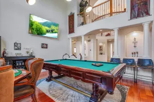 Image of Spacious & Cozy Winter Retreat: Scenic Views, Luxury, Pool Table, Crystal Chandelier, Hardwood.\"