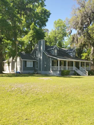 Image of Large custom home with pool centrally located to beaches, parks, and family fun.