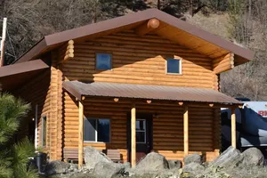 Image of Modern log cabin with a cozy cabin feel along the Clearwater River.