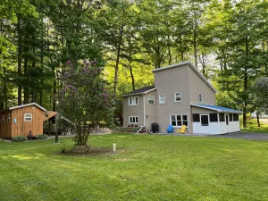 Image of Private, cozy retreat on a wooded lot steps away from Cassadaga Lake.