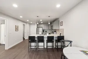 Image of King Bed - J and K on Main Luxury Apartment 306