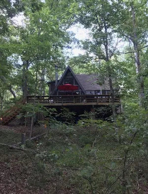 Image of Come enjoy this lovely 3 bedroom 2 baths lakefront chalet with a swimming dock.