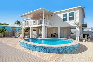 Image of Canal-front Dog-Friendly Home with private pool, WiFi, washer\/dryer & central AC