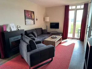 Image of Dog-friendly vacation apartment close to the beach with sauna, terrace and beach chair - Resort Deichgraf
