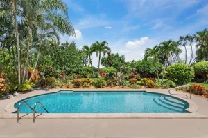 Image of Tropical Oasis ~ Split Floor Plan ~ Stunning Gardens ~ Heated 32' Saltwater Pool