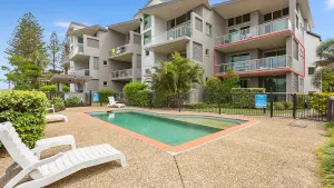 Image of Beach Bliss Apartment with Pool