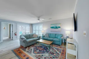 Image of Beautifully updated condo with outdoor pool, beach access, AC & washer\/dryer