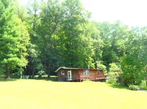 Image of Ohio Cabin near Amish Country Pro Football HOF Hiking trails Near lake Fire Pit.