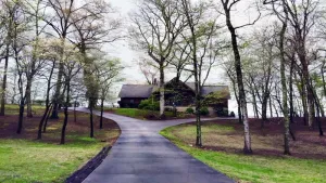 Image of Gorgeous Lakefront Log Home w\/ Pool & Boat Dock on 3 Fenced Acres! Dogs Welcomed