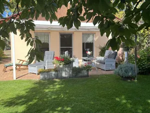 Image of Holiday Home 'Ferienhaus 75 Qm, 1 Schlafzimmer' with Private Terrace, Shared Garden and Wi-Fi