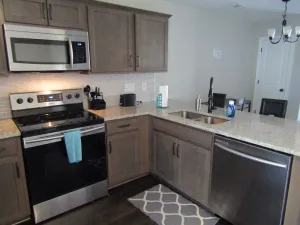 Image of Cheerful 2-Bedroom Townhouse with Pool