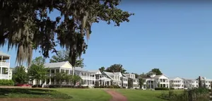Image of Southern Luxury Carriage House with Lakefront View By Villa Real Escapes