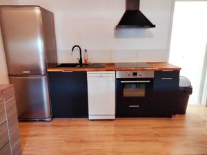 Image of 3-bedroom apartment with spacious living room, reading area and fully-equipped kitchen.