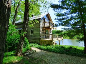 Image of Beautiful, 200 year old Log home - Secluded, 30 Min. from Downtown