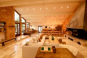 Image of eco-lodge with natural swimming pool