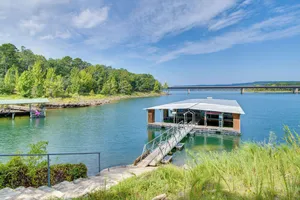Image of Lakefront Greers Ferry Cabin with Covered Boat Slip!