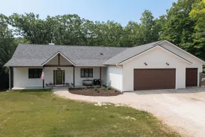 Image of House Neighboring Road America and the Mullet River