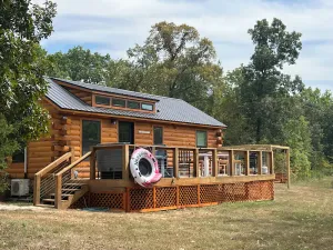 Image of Log Cabin on the waterfall