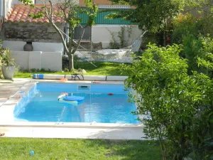 Image of Pretty village house with private heated pool. Opposite historic church.