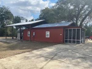 Image of 2 BR 2 Bath Cabin on private 1.5 acres.Huge cement pad for parking. No clay road