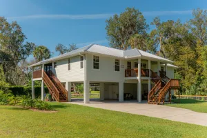 Image of Pleasant Point, a blue spring waterfront home on Kings Bay in Crystal River, Fl.