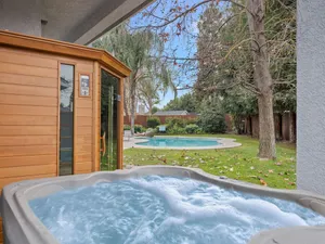 Image of Home oasis with sauna, jacuzzi, pool & heated gazebo!