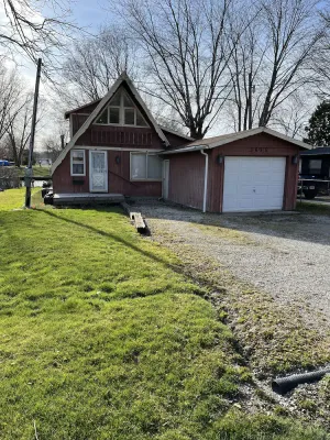 Image of 3 bedroom 2 bath renovated A frame on channel to Kuhn lake and the Barbee Chain