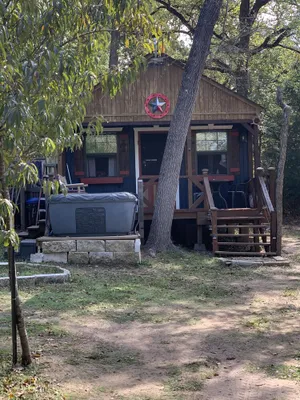 Image of Private Cabin with hot tub. Nestled in the Woods just off Lake Limestone, Texas.
