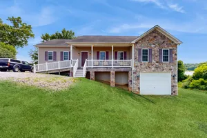 Image of Two-story, lakefront getaway with dock, beach, grill, 2 kayaks, 2 canoes, AC