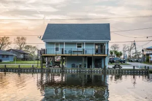 Image of Scenic Bayou Side Home; Cocodrie Robinson Canal Bridge is open!