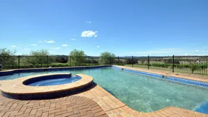 Image of Beggars Bridge Vineyard Homestead with pool and tennis