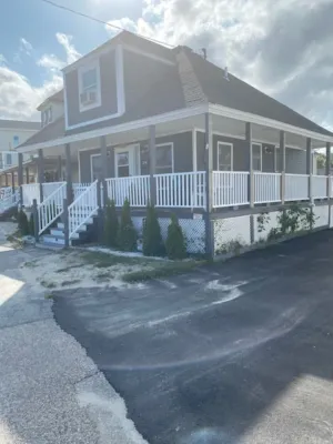 Image of SOPHIA ' S  PLACE   (  OCEAN BOULEVARD STEPPING FROM THE WATER .)