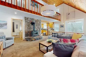 Image of Updated home on quiet street w\/ gas fireplace, shared hot tub, pool, & more
