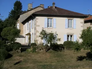 Image of House with fenced garden in village