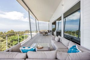 Image of PANORAMIC VISTAS OF THE PRISTINE COASTLINE & TURQUOISE WATERS OF EAGLE BAY.