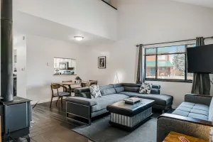 Image of Two-Level Condo w\/ Mountain View, Wood Stove, WiFi, Laundry & Central Location