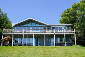 Image of Scenic lakefront home with gas fireplace, high-speed WiFi, & patio