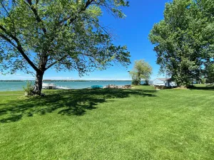 Image of Includes all 3 lakefront Cabins with private beach and yard.  Inckudes 4 kayaks