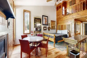 Image of Eclectic second floor condo w\/ loft, balcony, & gas fireplace - family friendly