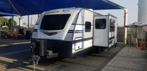Image of Entire RV w\/Murphy Bed, 5-Seater Couch w\/Dinette & 2-Bunkbeds