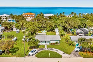 Image of Inviting home near the water with gazebo, fire table, heated pool & spa
