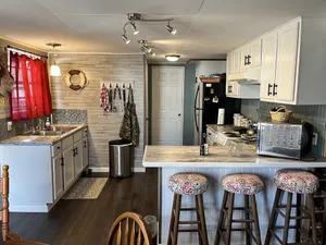 Image of Cozy, private, rustic-modern cabin, a doorway to fine fishing and lake fun!