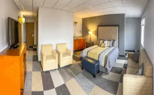 Image of Coratel Inn by Jasper Iowa Fairfield - Deluxe 1 King Suites with Sofa Bed NS